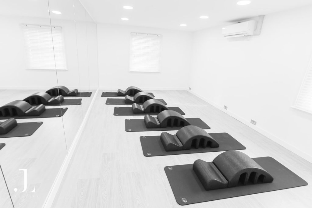 Close-up of suspension training straps during a Pilates studio photography session in Surrey.